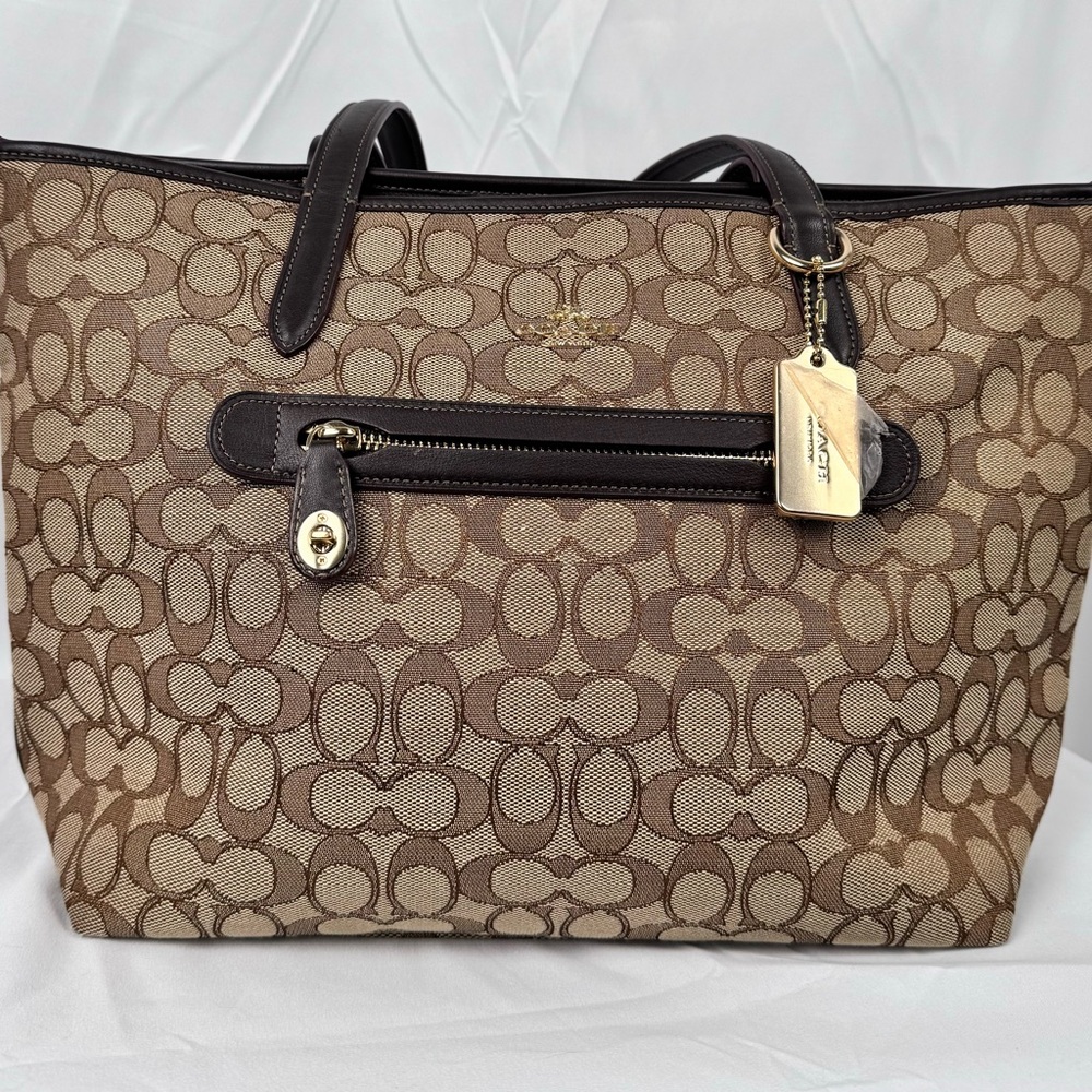 Coach Taylor Tote in Signature Jacquard.